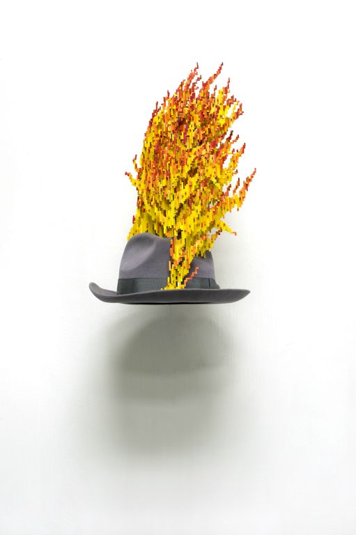Schrodinger's Hat (2009) 22 x 10 inch diameter. Bass wood, ink,
acrylic paint, felt fedora